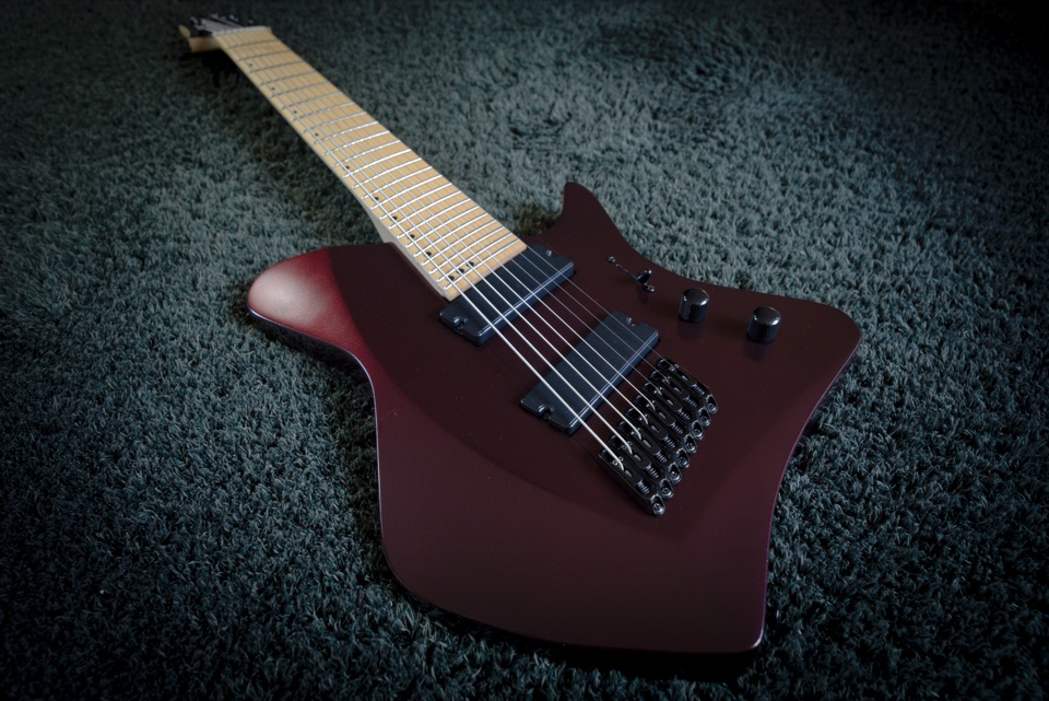 Custom 3D-printed guitar body in a dark red finish